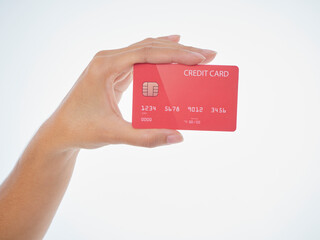 Woman holding credit card on white background