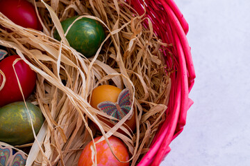 Colored Easter eggs in a basket