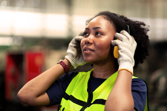 Close-up, American female engineer in the industrial plant