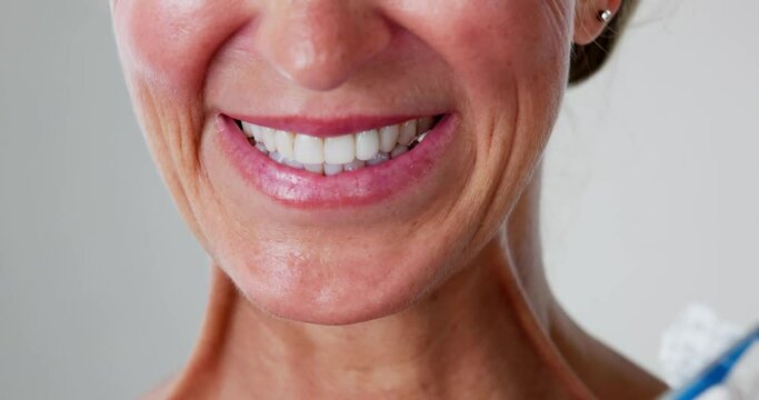 Woman Using Nicotine Gum To Quit Smoking