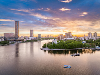 Fototapeta premium Yekaterinburg city with Buildings of Regional Government and Parliament, Dramatic Theatre, Iset Tower, Yeltsin Center, panoramic view at summer sunset.
