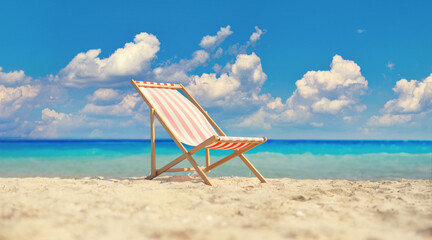 Deck chair on a sandy beach