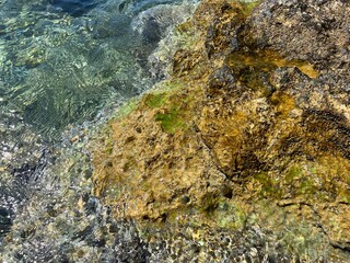 Rock stones in the sea water.