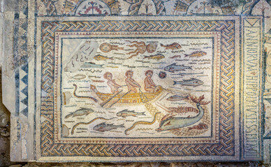 Mosaic representing a fishing scene. This mosaic is part of the House of Hippolytus, an archaeological site located in  Complutum, a Roman City located in Alcala de Henares, Madrid, Spain. - 618599478