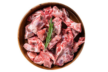 Fresh Raw meat on the bone diced for goulash in a wooden plate.  High quality Isolate, transparent...