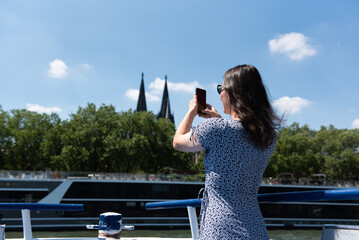 a woman enjoys a boat trip on the Rhine