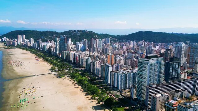 Aerial view of the coastline of Santos. Buildings on the beachfront. Aerial view of the city of Santos. Santos port and favelas in the background. Santos, S&atilde;o Paulo, Brazil.