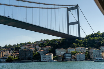 Fatih Sultan Mehmet Bridge and Turkish Flag on the Bosphorus. Istanbul, Turkey. (Fatih Korosu,...