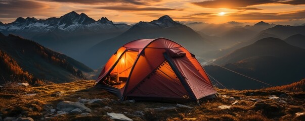 Camping on the top of the mountain at sunset. Panorama