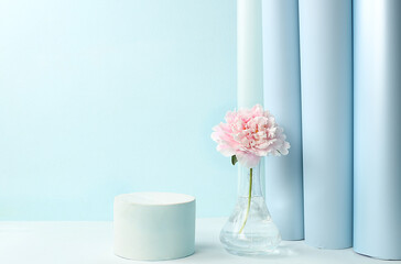 Stage for product display and business concept.Minimal modern aesthetic.Beautiful flower arrangement,Empty podium for product and fresh peony flowers,elegant beauty concept