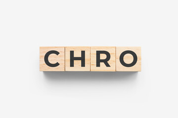 CHRO (Chief Human Resources Officer) wooden cubes on grey background