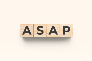 ASAP (As Soon As Possible) wooden cubes on grey background