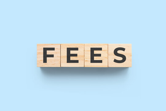 Fees wooden cubes on blue background