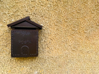 Mailbox on the wall of an old house