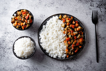 Roasted eggplants with vegetables and rice