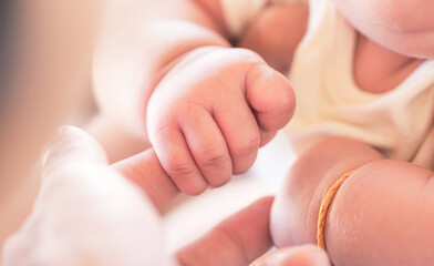 Baby hand,Newborn baby hand in mother hand, mother and her baby, happy family concept, beautiful conception image of childbirth. 