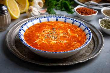 Chicken noodle soup with tomato. Turkish name; Domatesli tavuklu sehriye corbasi