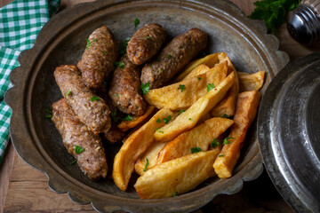 Traditional Turkish food; dry meatballs or inegöl meatballs with potatoes (Turkish name; Kuru kofte or anne koftesi)