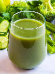 A glass of green celery juice. Celery drink prepared for healthy nutrition and detox.