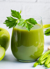 A glass of green celery juice. Celery drink prepared for healthy nutrition and detox.