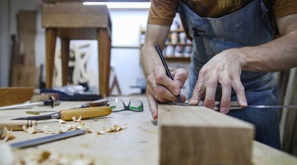 handsome skilful woodworker