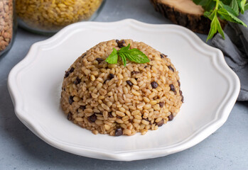 Traditional delicious Turkish foods; bulgur pilaf with green lentils (Turkish name; yesil mercimekli bulgur pilavi)