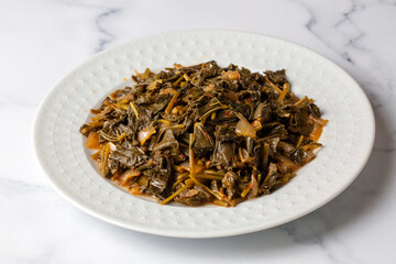 Traditional delicious Turkish food; hibiscus - malva dish (Turkish name; Ebe gumeci - ebegumeci yemegi, kavurma)