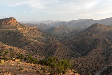 Fototapeta na wymiar Sunset over a beautiful peaceful landscape of the Anti-Atlas mountains near Tirourgane
