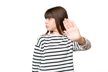 Little caucasian girl over isolated background making stop gesture and disappointed