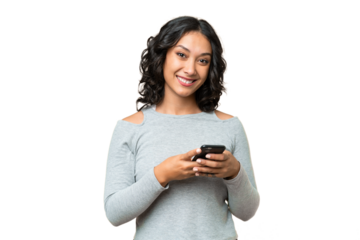 Young Argentinian woman over isolated background sending a message with the mobile
