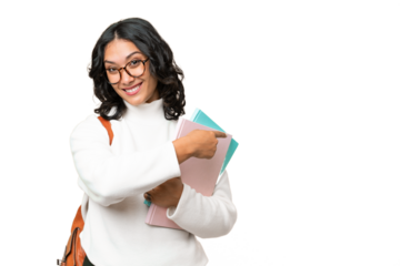 Young Argentinian student woman over isolated background pointing back