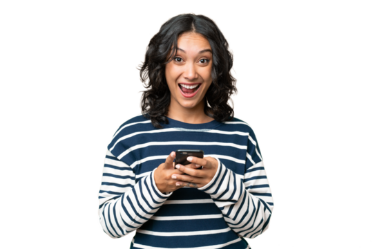Young Argentinian woman over isolated background surprised and sending a message