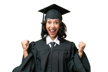 Young university graduate Argentinian woman over isolated background celebrating a victory in winner position