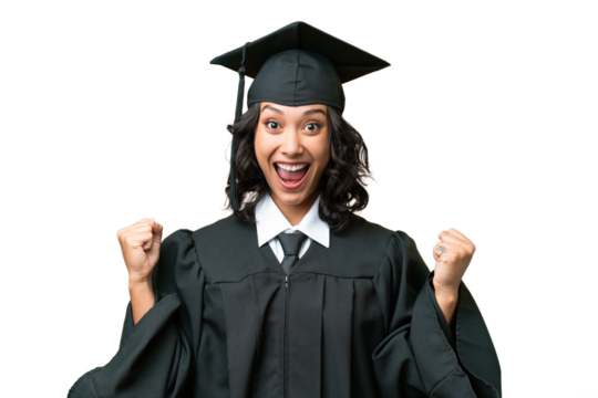 Young university graduate Argentinian woman over isolated background celebrating a victory in winner position