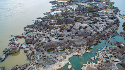 Aerial view above 3000 bok unseen beautiful rock of Mekong river..Amazing big rock with many...