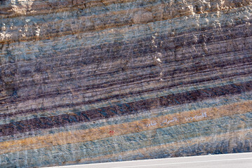 Scenic natural colorful lines of a rock in the Moroccan Anti Atlas