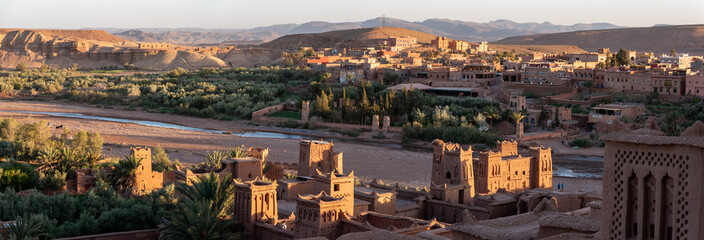 Sunset over the beautiful historic town Ait Ben Haddou, famous berber town with many kasbahs built...