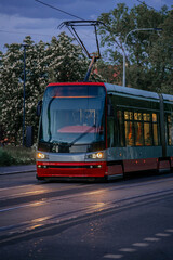 Obraz premium A modern tram in the streets of Prague's old town in 2023.