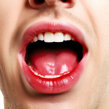a close up of a person's mouth and tongue