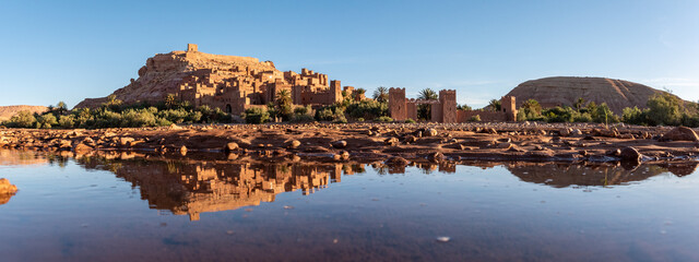 Sunrise over the beautiful historic town Ait Ben Haddou, famous berber town with many kasbahs built...