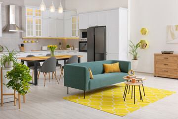 Spring interior. Stylish room with comfortable furniture