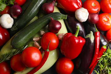 Cooking delicious ratatouille. Fresh ripe vegetables as background, top view