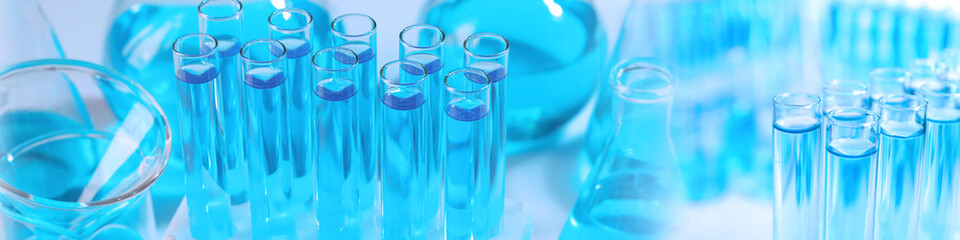 Chemistry and chemical research. Collage of different laboratory glassware with liquids, blue tone effect. Banner design
