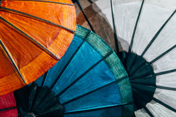 close up view of multi colored paper umbrellas