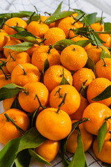 fresh orange fruits with white background, top view or flat lay 