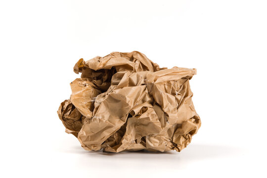 crumpled  brown paper ball trash isolated on white background