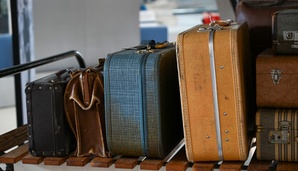 Vintage luggage waiting to be retrieved in a classic travel setting for a 1940s family vacation