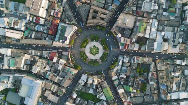 Wongwian Yai roundabout. Aerial view of highway junctions. Roads shape circle in structure of architecture and technology transportation concept. Top view. Urban city, Bangkok, Thailand.