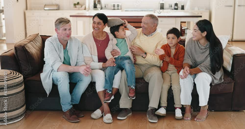 Poster Happy, generations and smile with big family on sofa for bonding, relax and free time. Happiness, retirement and love with children and grandparents in living room at home for playful, care and youth