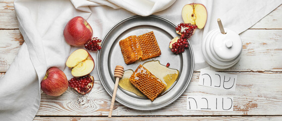 Composition for Rosh hashanah (Jewish New Year) celebration on light wooden background